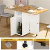 A dining table with chairs and storage, set up in a room. Produktbild-Vorschau
