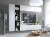 A modern living room with a wall-mounted entertainment unit, TV, speakers, and decorative items. Náhľad obrázku produktu