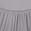 A close-up view of a grey fitted sheet with elastic gathering at the top. Náhľad obrázku produktu