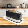 A toaster on a kitchen counter with bread inside. Náhľad obrázku produktu