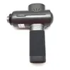 A dark gray massage gun with a black grip is shown against a white background. Produktbild-Vorschau