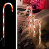 Christmas candy cane lights in the snow. Produktbild-Vorschau