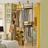 Garderobenständer SoBuy KLS04-SCH im Wohnraum mit Kleidung und Accessoires Produktbild-Vorschau