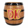 A barrel-shaped cookie jar with the letters 'DK' on the front. Produktbild-Vorschau