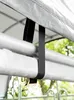 Close-up of straps and metal poles of a tent or shelter. Produktbild-Vorschau