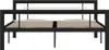 A front view of a black metal bed frame with a beige mattress base. Náhled obrázku produktu
