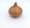 A wooden-patterned ultrasonic humidifier is placed on a white background. Podgląd zdjęcia produktu