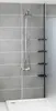 A shower stall with a tiled wall, a shower head, and a telescopic shelf unit. Náhled obrázku produktu
