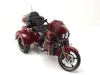 A model of a red Harley Davidson trike motorcycle is shown against a white background. Anteprima dell’immagine prodotto
