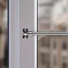 Close-up of a window curtain rod bracket and rod. Anteprima dell’immagine prodotto