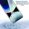 A close-up of a smartphone screen protector with water droplets on it, demonstrating its water-repellent properties. Náhľad obrázku produktu