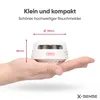 A hand holding a small, white smoke detector with dimensions indicated. Produktbild-Vorschau