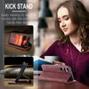 A woman is looking at a phone case with a kickstand feature. Produktbild-Vorschau