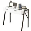 A white desk with black legs, featuring two drawers, a keyboard, a tablet, books, and a desk lamp. Podgląd zdjęcia produktu