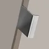 A close-up of a modern cabinet handle with a metallic finish. Produktbild-Vorschau