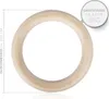 A wooden gymnastic ring on a white background with measurement indicators. Produktbild-Vorschau