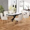 A dining room scene with a table and chairs. Podgląd zdjęcia produktu