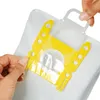 Hands holding and attaching a vacuum cleaner bag. Produktbild-Vorschau
