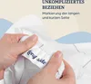 Hands holding a white sheet with a label indicating 'long side'. Produktbild-Vorschau