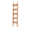 A wooden ladder shelf against a white background. Náhled obrázku produktu
