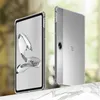 Two transparent phone cases are displayed on a marble surface with a blurred background. Náhled obrázku produktu