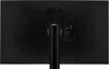 The back of a black LG monitor is shown, with the LG logo at the top and ports visible on the right side. Produktbild-Vorschau