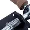 A close-up view of a black spring-loaded bolt latch with a wooden handle. Produktbild-Vorschau