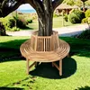 A circular wooden bench around a tree trunk in a garden setting. Produktbild-Vorschau