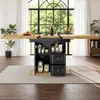A dining table with storage is set up in a bright room with large windows overlooking greenery. Náhled obrázku produktu