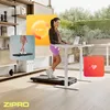 A woman is using a treadmill desk in a modern home office setting, with digital overlays showing fitness data. Podgląd zdjęcia produktu