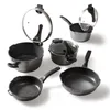 A collection of cookware items, including pots and pans, arranged on a white background. Anteprima dell’immagine prodotto