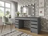 A modern bedroom or dressing room setting with a vanity table and chair. Produktbild-Vorschau
