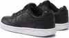 A pair of black Nike Ebernon Low trainers with white soles, shown from a side-rear angle. Produktbild-Vorschau