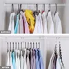 A side-by-side comparison of a messy closet with clothes hanging haphazardly on hangers and an organized closet using specialized hangers that maximize space. Produktbild-Vorschau
