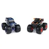 Two monster trucks are shown against a white background. Voir les images du produit