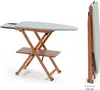 A wooden ironing board with a patterned cover, shown both open and folded. Produktbild-Vorschau