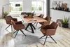 A dining room setting with a live-edge wood table and six brown chairs. Produktbild-Vorschau
