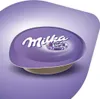 A close-up shot of a Milka hot chocolate pod. Produktbild-Vorschau