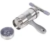 A stainless steel pasta maker with its interchangeable die attachment shown separately. Produktbild-Vorschau