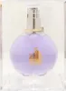 A perfume bottle in a clear display case. Náhľad obrázku produktu
