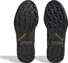 The soles of two black Adidas Terrex hiking shoes are shown from underneath. Produktbild-Vorschau