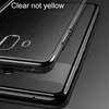A close-up shot of a clear phone case with gold trim, showcasing its transparency and design. Produktbild-Vorschau