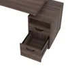 A close-up view of a brown wooden desk with an open drawer. Podgląd zdjęcia produktu