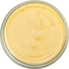 A top-down view of a glass jar filled with a creamy yellow substance, likely a food product. Produktbild-Vorschau