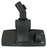 A black vacuum cleaner floor head or nozzle is shown from the front, isolated on a white background. Produktbild-Vorschau
