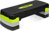 A black aerobic step with neon green and gray accents, shown from a slight angle on a white background. Voir les images du produit
