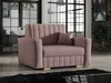 A pink upholstered armchair with a small pillow sits in a modern living room with large windows and a brick wall. Náhled obrázku produktu