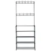 A tall, black metal garment rack with multiple shelves for shoes and hooks for hanging clothes. Anteprima dell’immagine prodotto