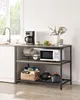 A kitchen shelving unit with various kitchen appliances and cookware. Náhled obrázku produktu