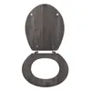 A toilet seat and lid are shown in an open position against a white background. Podgląd zdjęcia produktu